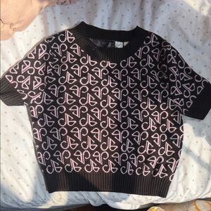 H&M Black Short-Sleeve Knit Top with Pink Pattern